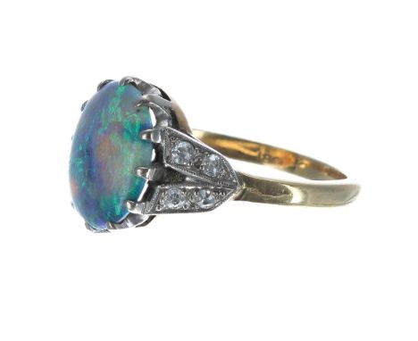 18ct yellow gold cabouchon black opal and diamond ring, the opal 2.00ct approx, 4.3gm, width 13mm, ring size M 