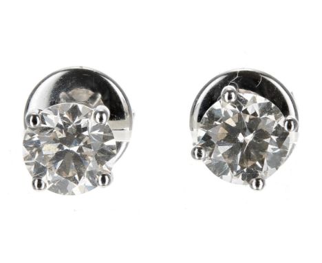 Pair of 18ct white gold four claw set round brilliant cut diamond ear studs, 1.27ct in total, clarity SI, colour J/K, 2.2gm, 