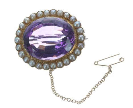 Large oval amethyst and pearl brooch in yellow metal, with safety chain, 21.9gm, 32mm x 38mm 