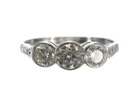 Good platinum three stone diamond ring with set shoulders, rub-over set round brilliant-cuts, 1.20ct approx, clarity SI, colo