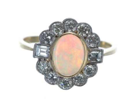 18ct yellow gold opal and diamond oval cluster ring, the opal 0.80ct approx, total diamond weight 0.70ct, 3.2gm, 14mm x 13mm,