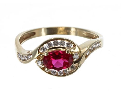 Attractive 14ct yellow gold synthetic ruby and diamond oval cluster ring, the ruby 0.60ct approx,&nbsp;3.7gm, width 10mm, rin