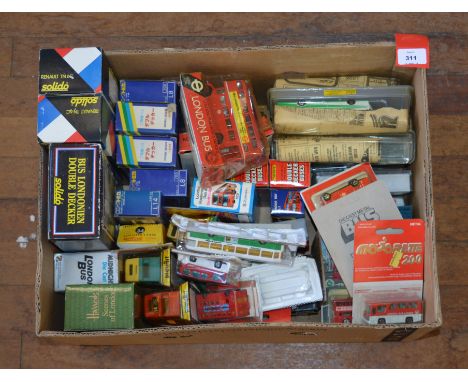 A quantity of  boxed and carded diecast model buses in a variety of different scales by Solido, Meotsul, Majorette, Tomica an