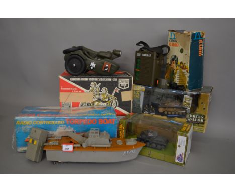 A mixed lot of boxed  toys including a Cherilea German Army Motor Cycle, an ITT Combat Radio, two boxed Tank models in 1:32 s