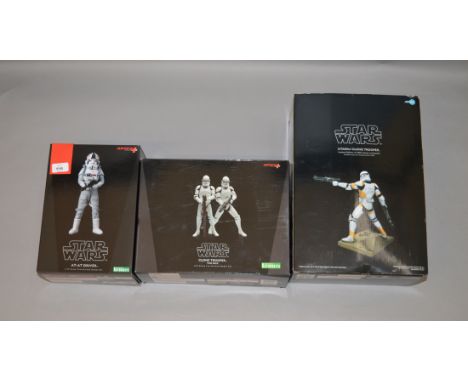 Three Kotobukiya ArtFX Star Wars pre-painted model kits: Utapau Clone Trooper 1:7 scale; AT-AT Driver 1:10 scale; Clone Troop