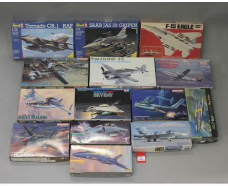 Fourteen boxed aviation related model kits by Revell, Hasegawa, Dragon and others, mostly of fighter aircraft in 1:72 and 1:1