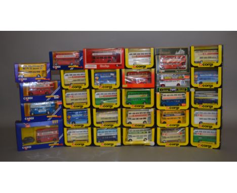 Thirty two boxed Corgi diecast model buses in a various different liveries, including 469 Routemaster 'World Airways', D599 A