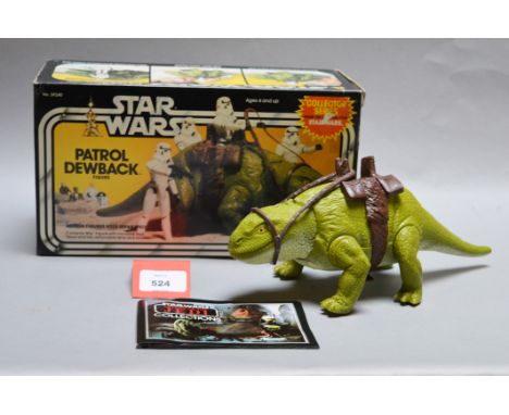 Kenner Star Wars Patrol Dewback. Figure is E with reins, in G+ box with later ROTJ leaflet.
