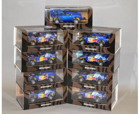 Minichamps. Nine VW Race Touareg diecast model cars in 1:43 scale including various Rally versions, 'Homologation Version' an