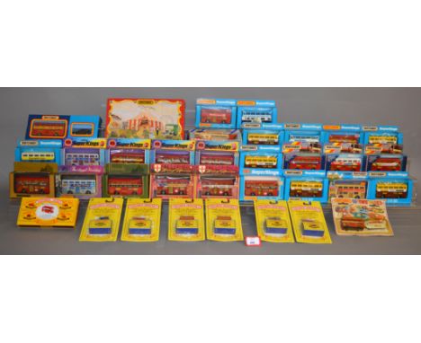 Twenty four boxed Matchbox Super KIngs K-15 'Londoner Bus' diecast models, various different liveries including 'Harrods', 'H