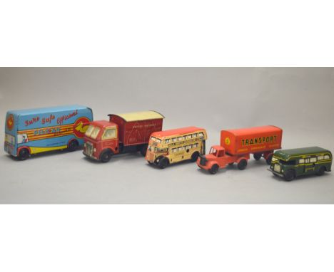 Five unboxed vintage tinplate and plastic models with clockwork and friction drive including a Chad Valley 'British Railways'