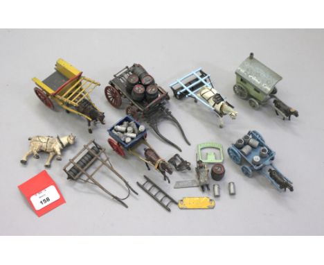 A small quantity of unboxed vintage horse drawn diecast models including a Salco Gypsy Caravan, missing steps and driver figu
