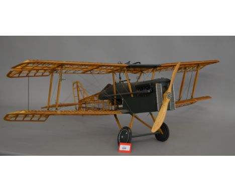 A wooden model SE5 aeroplane, possibly 1:8 scale, with working parts, length approx. 80cm, wingspan approx. 95 cm.