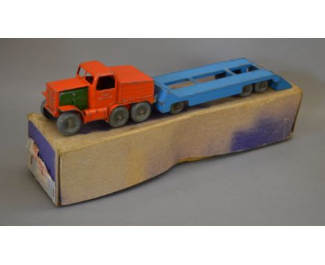 A boxed Lesney-Moko British Road Services Prime Mover and Trailer, a large scale model with orange tractor unit having grey p