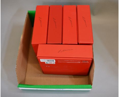 Five Hot Wheels diecast Ferrari models in 1:43 scale including a 1971 312B2, a 1974 312B3/74, a 1975 312T, a  1977 312 T2, to