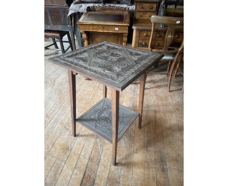 A carved lamp table dated 1917, 53 cm wide
