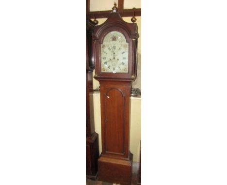 A Georgian oak longcase clock, the trunk with full length door, the arched hood with column supports, enclosing a broken arch