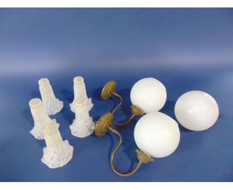 A box containing a collection of vintage lighting, mainly opaque glass shades