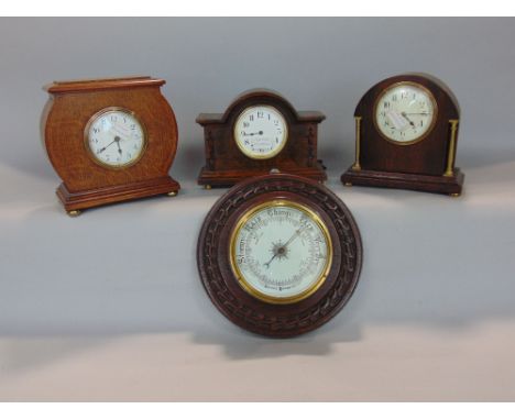 Three early 20th century oak cased mantle clocks, all in architectural cases with platform and escapements together with a wh