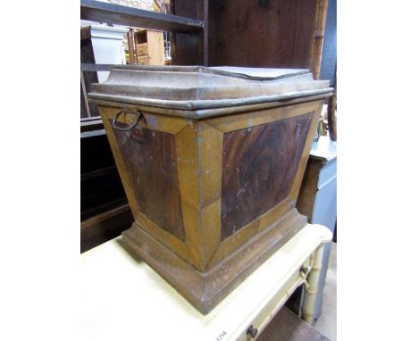 An unusual Victorian tin/light steel framed sarcophagus shaped campaign commode with simulated wood grain finish and hinged l