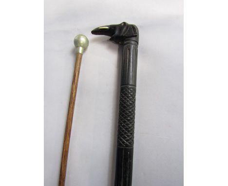 African ebony walking cane, the crook in the form of an elephants head together with a further military swagger stick (2)