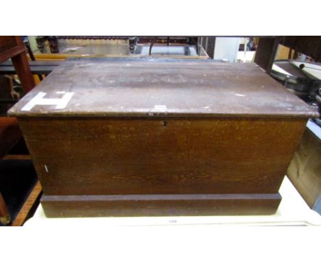 A Victorian pine blanket box with hinged lid, simulated wood grain and scumbled finish and decorative Tasmanian devil paper l