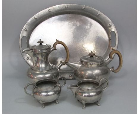 A Don Pewter five piece tea service in the manner of Archibald Knox of Liberty, the tray 47 cm long