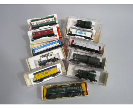 FLEISCHMANN DB Cat. No: 7334 class BR140 Bo-Bo Multi-purpose electric locomotive, dark green livery, with triple headlights f