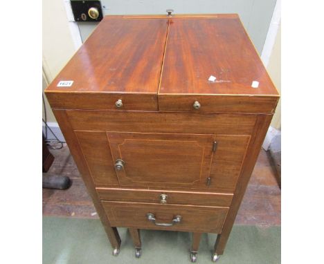 A Georgian mahogany fold over top commode (internally converted) the front elevation enclosed by central door and two frieze 