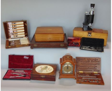 A box of interesting items to include a students microscope, an Elliot miniature bracket type clock, a draughtsman's mahogany