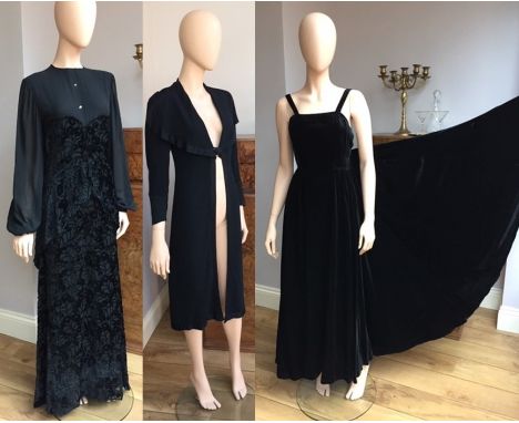 Three 1930s black ladies evening garments;  full length dress in a velvet flocked sheer fabric with dropped waist and two tie