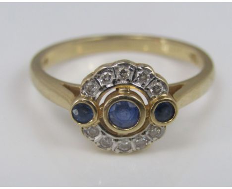 A 14ct sapphire and diamond cluster ring of openwork design, size Q, 3.4g