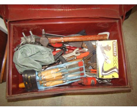 A small Victorian tin trunk containing a quantity of miscellaneous hand tools, to include a Stanley SB3 plane, further Firmer