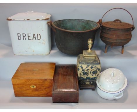 A collection of large miscellaneous items to include a pine wooden trunk, two iron cauldrons, an enamel bread bin, various tr