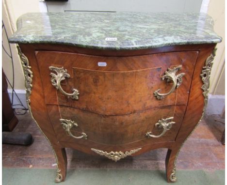 A French bombe shaped commode of two drawers with cross banded and string inlaid detail set beneath a green marble top with a