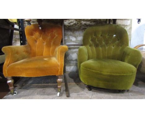 A Victorian spoonback drawing room chair with shaped outline, upholstered finish and turned forelegs with brass patent caps a
