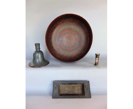 An interesting eastern lacquered pedestal bowl, with repeating geometric floral bands, 40cm diameter, together with a further