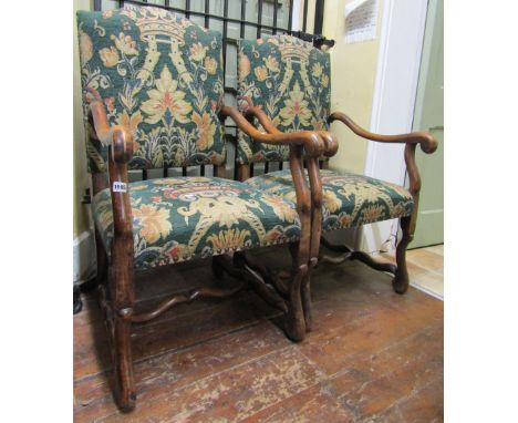 A pair of 19th century beech framed elbow chair, on scrolled supports and rails with recently re upholstered tapestry finish,
