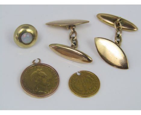 Mixed gold lot comprising a one dollar gold coin dated 1863 (drilled), a further mounted gold coin, a pair of 15ct torpedo cu