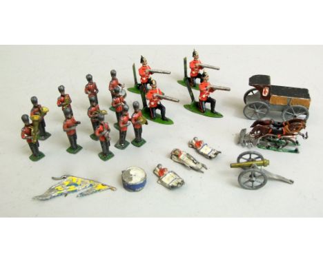 Eleven piece military band, four crouching riflemen, first aid wagon, etc