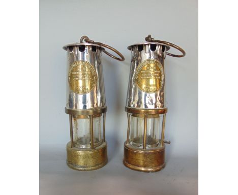 Pair of brass and steel miners lamps, inscribed Protector Lamp and Lighting Company Ltd, Eccles (2)
