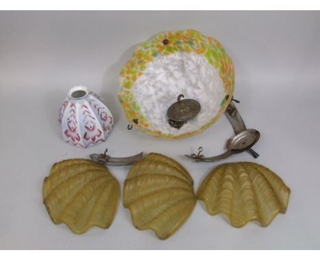 A mixed collection of Art Deco glassware to include a hanging lamp shade, a further faceted light shade and a hanging shell w