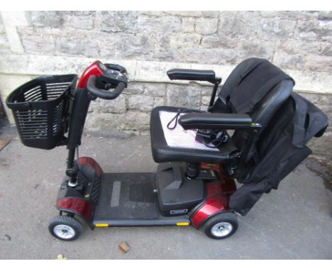 A Pathfinder mains battery rechargeable mobility scooter complete with owners manual and further paraphernalia 