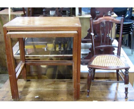 A Victorian stained beechwood child's or dolls size chair, with shaped cresting rail and entwined stick splat over a cane pan