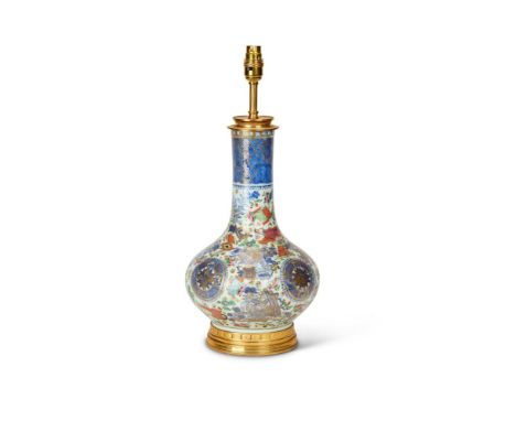 A CHINESE PORCELAIN FAMILLE-ROSE BOTTLE VASETHE PORCELAIN 18TH CENTURYNow fitted as a table lamp, with scattered emblems on a