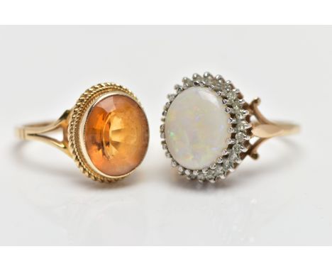 TWO 9CT YELLOW GOLD GEM SET RINGS, to include an opal and diamond cluster ring, the oval opal cabochon within a single cut di