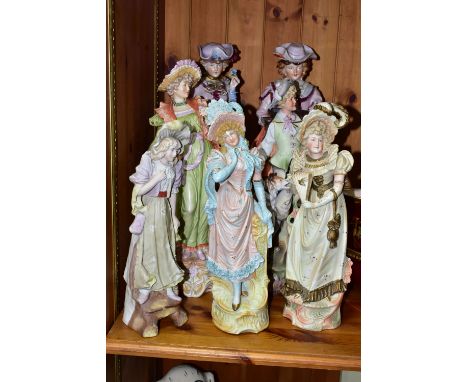 A GROUP OF CONTINENTAL PORCELAIN FIGURES, comprising seven male and female figures, one Sitzendorf lady (with repaired neck d