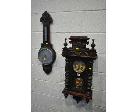 A LATE VICTORIAN WALNUT VIENNA WALL CLOCK, height 86cm, with one winding handle, and an aneroid barometer (2)