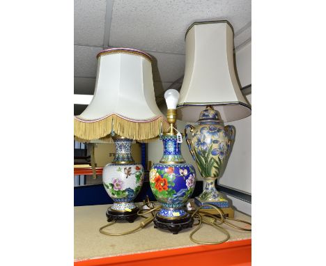 THREE JAPANESE STYLE TABLE LAMPS, comprising a crazed effect urn form lamp base decorated with blue iris on a cream ground wi