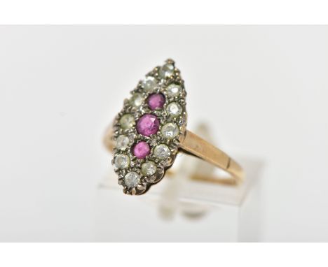 A 9CT GOLD RUBY AND DIAMOND CLUSTER RING, of a navette shape, to the centre sits three circular cut rubies, in a surround of 